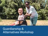 Two smiling men pose in a sunny, leafy park, one seated in a wheelchair. A blue banner reads “Guardianship & Alternatives Workshop”