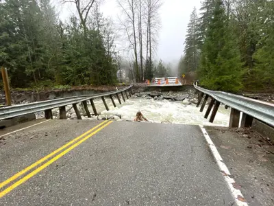 Road washed out at Jordan Creek from flooding.